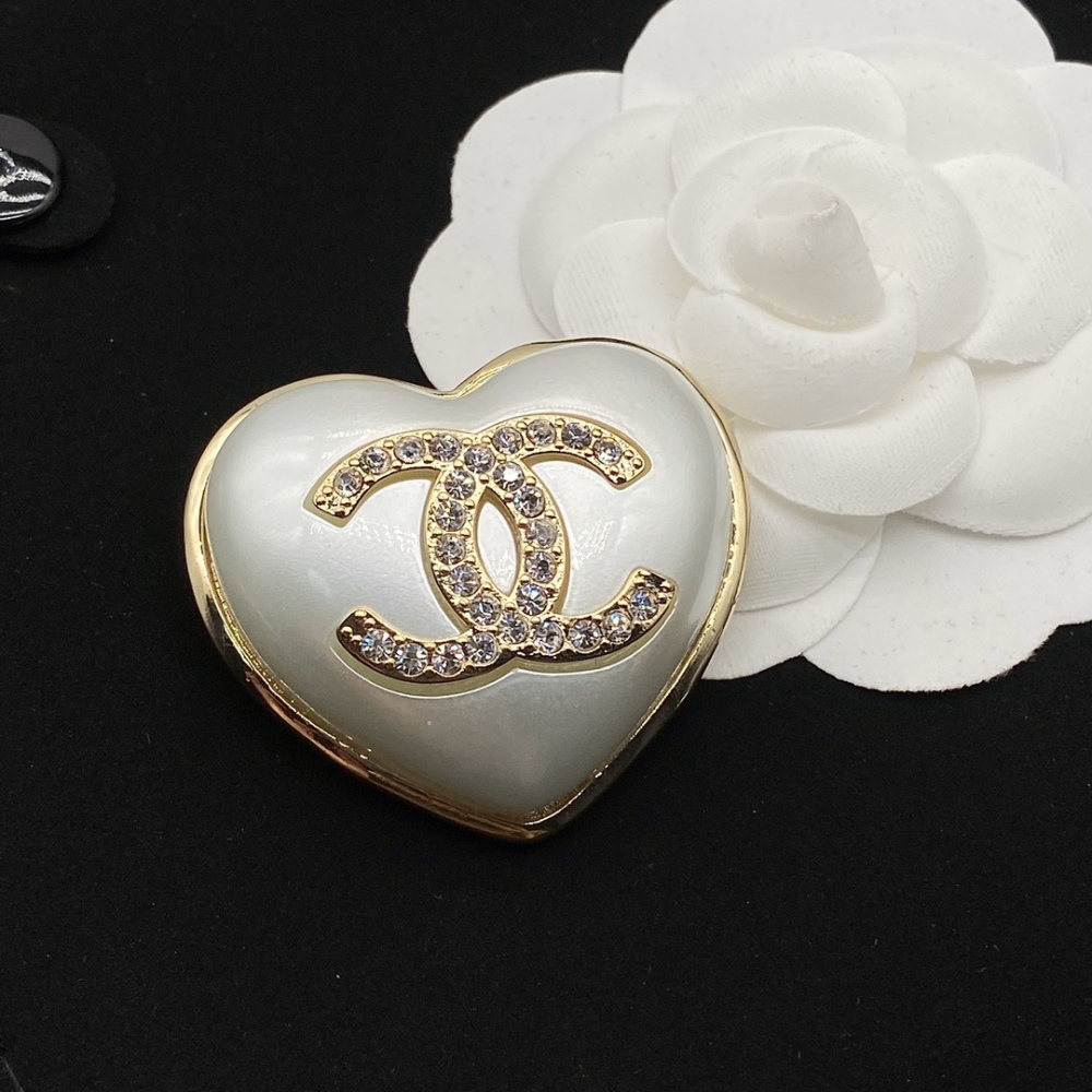 chanel peach heart brooch