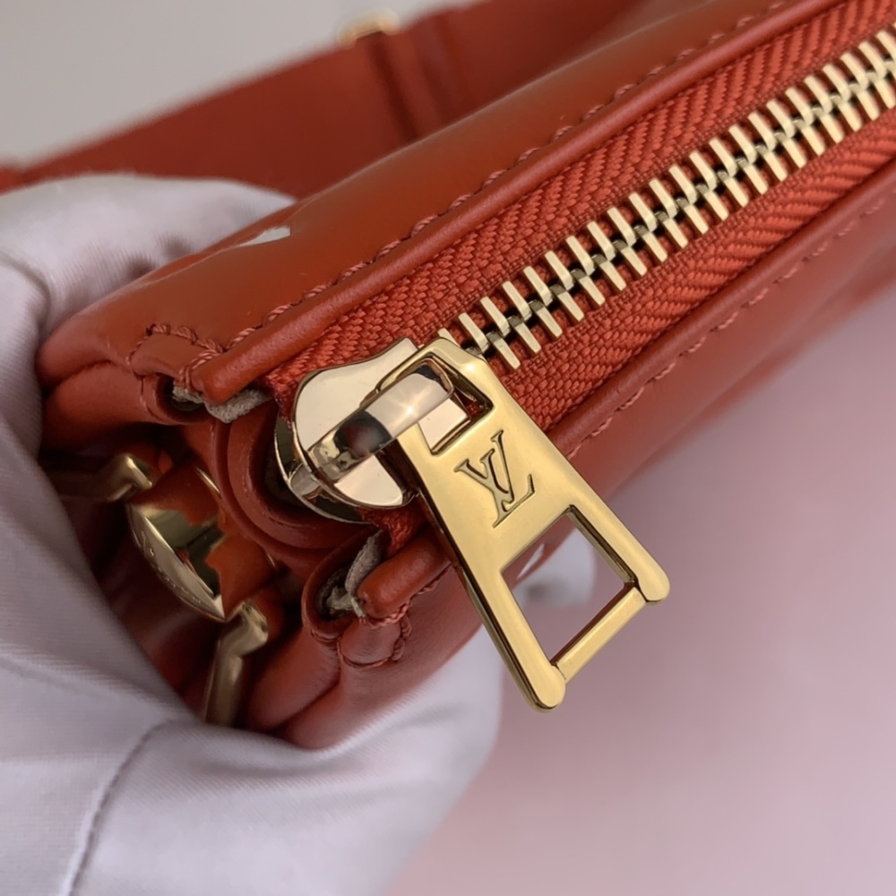 Louis Vuitton COUSSIN mirror boutique