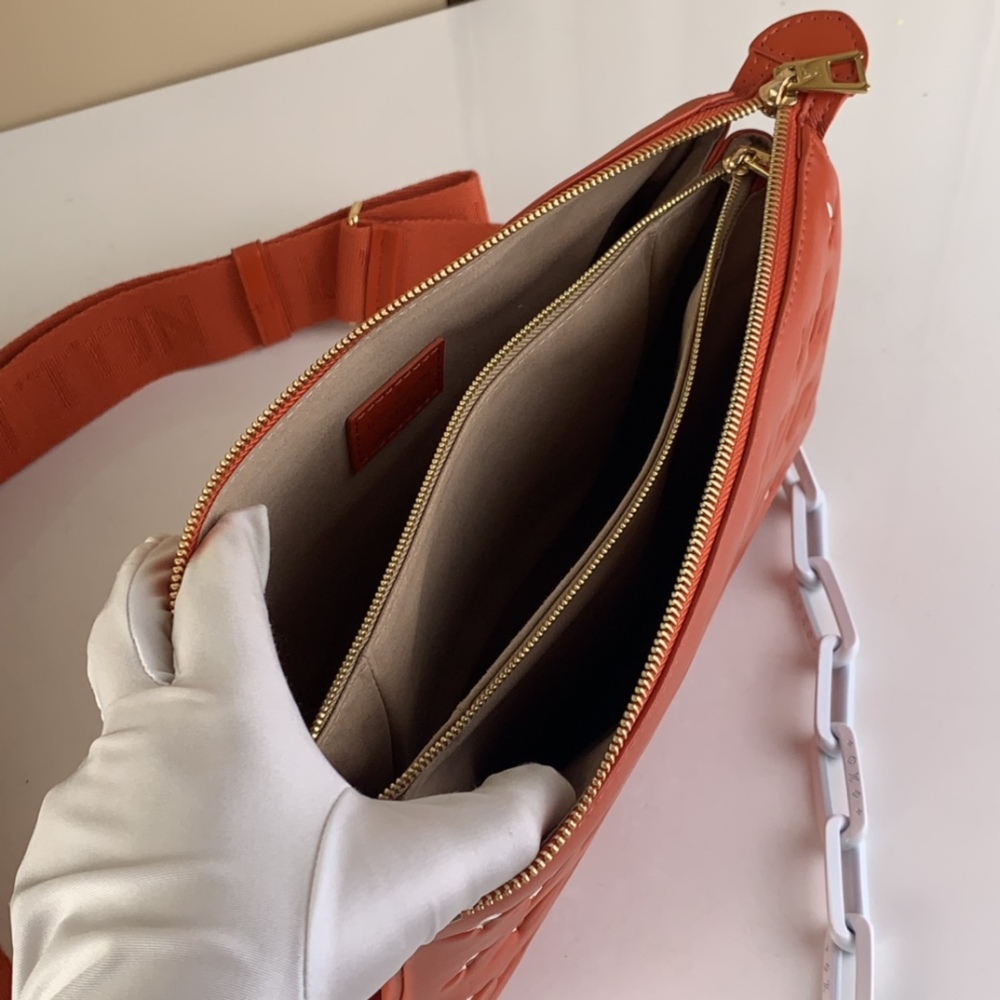Louis Vuitton COUSSIN mirror boutique