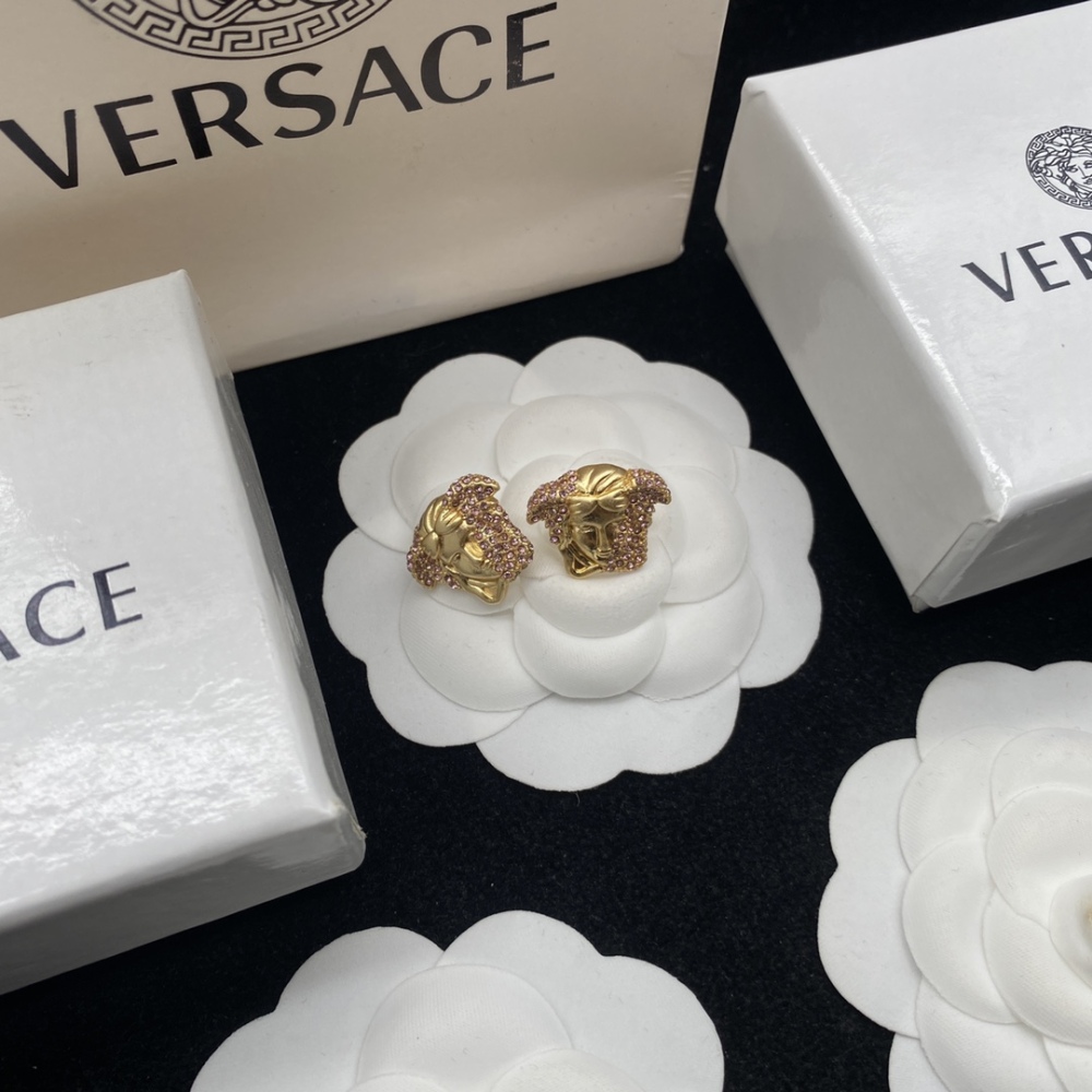 Versace stud earrings