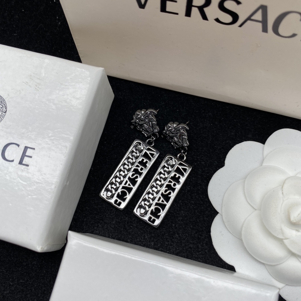 Versace stud earrings