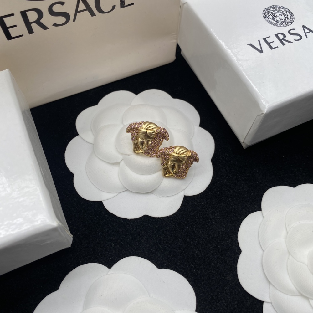 Versace stud earrings