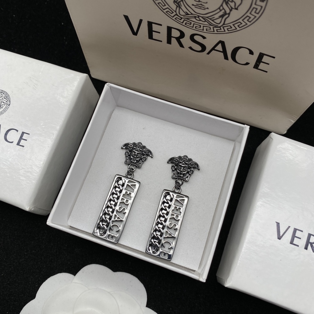 Versace stud earrings