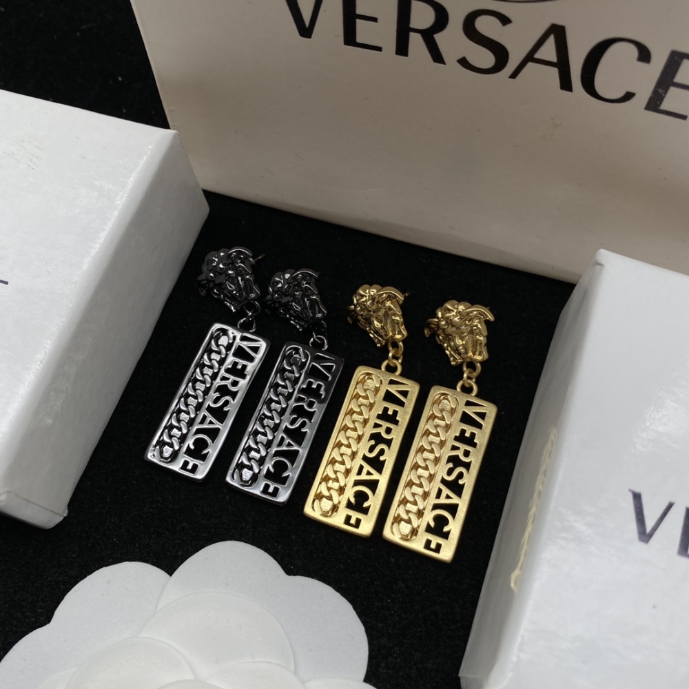 Versace stud earrings