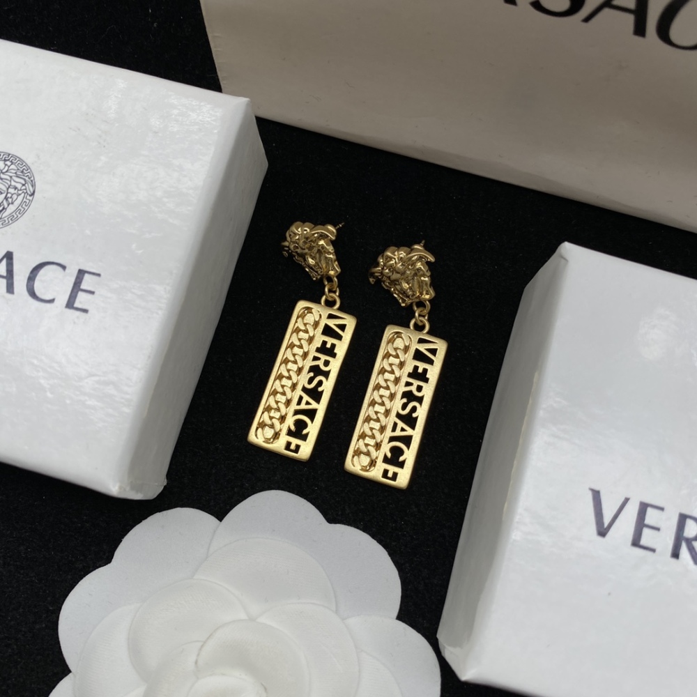 Versace stud earrings