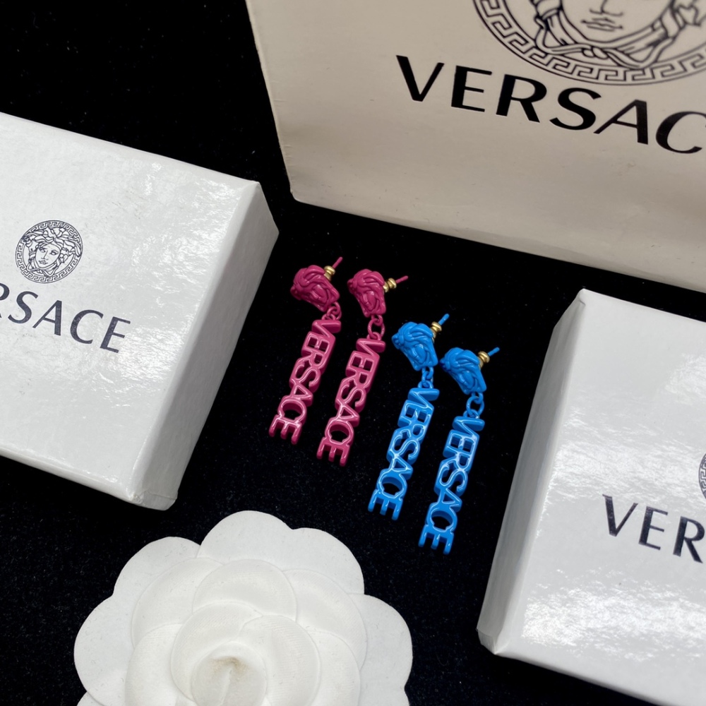 Versace stud earrings