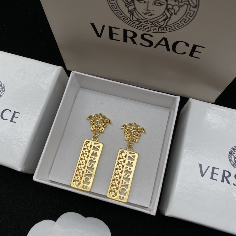 Versace stud earrings