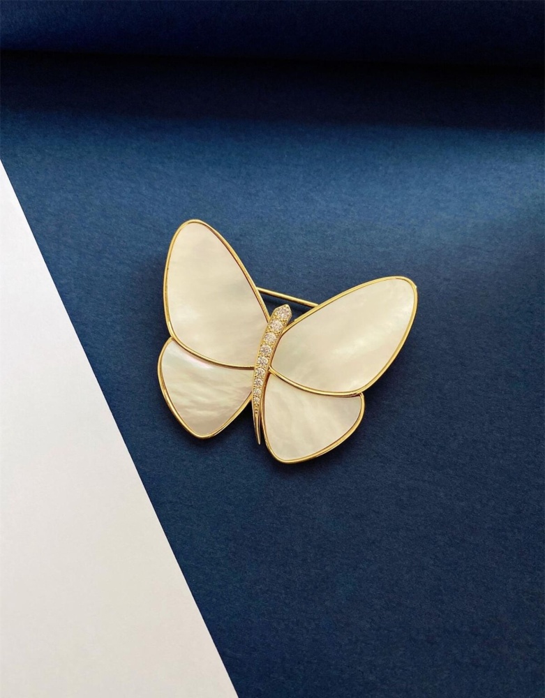 VCA brooch