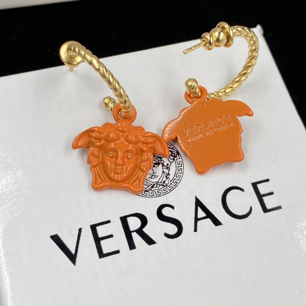 Versace stud earrings
