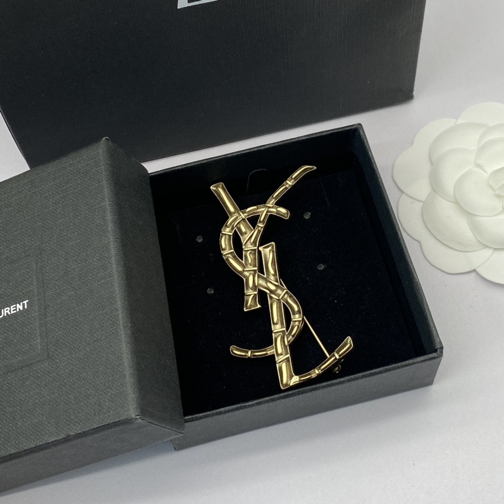 YSL brooch