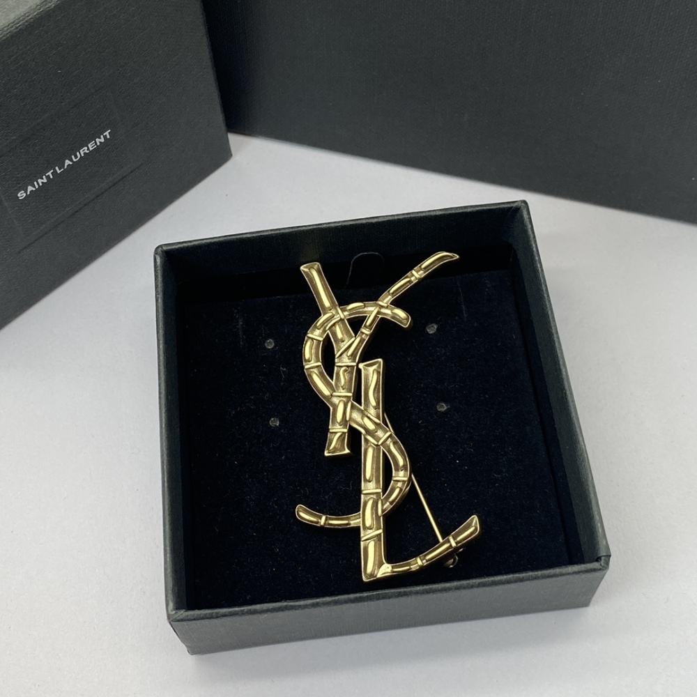 YSL brooch