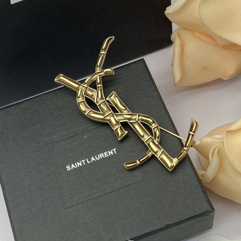 YSL brooch