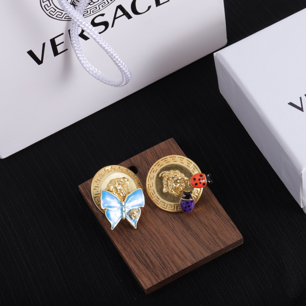 Versace stud earrings