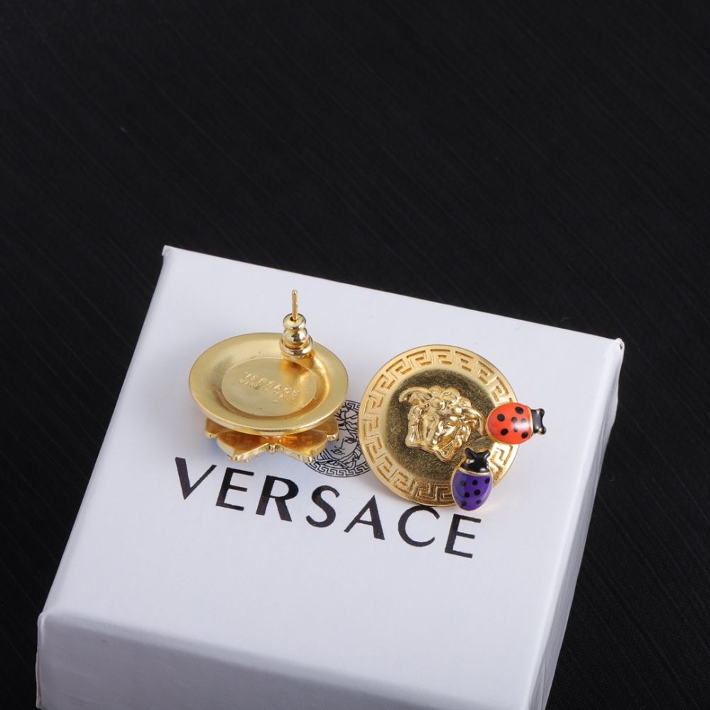 Versace stud earrings