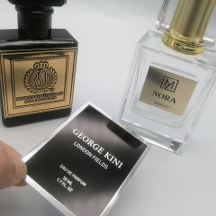 Étiquettes personnalisées de haute qualité Logo Impression extérieure Gaufrage Étiquette en aluminium Autocollant en aluminium en métal en gros pour bouteille de parfum Bouteille de vin