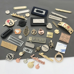 Étiquette métallique avec logo personnalisé Logo personnalisé Logo métallique de marque de haute qualité Étiquettes métalliques personnalisées pour étiquette de vêtements Étiquette de sac