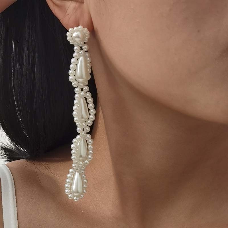 Wholesale Creative Fashion Pearl Long Pendant Earrings Women Simple Retro Earrings Vendors