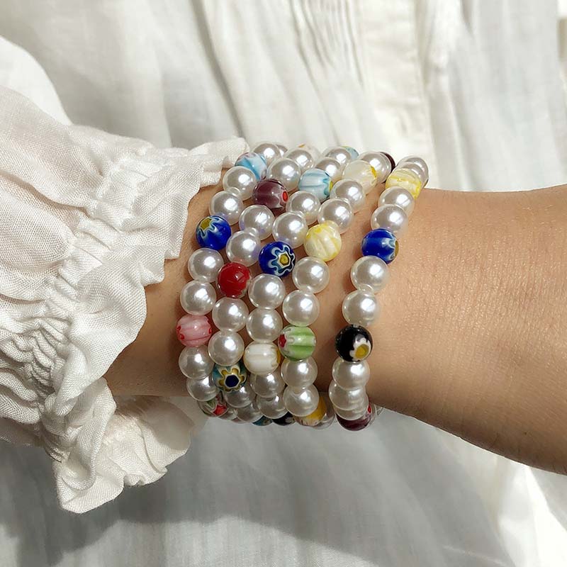 Wholesale Korean Lucite Flower Pearl Design Sense Of Stretch Bracelet