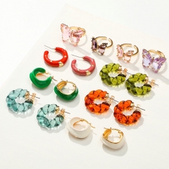 Solid Color Clear Resin C-shaped Twisted Hoop Earrings For Women Distributor