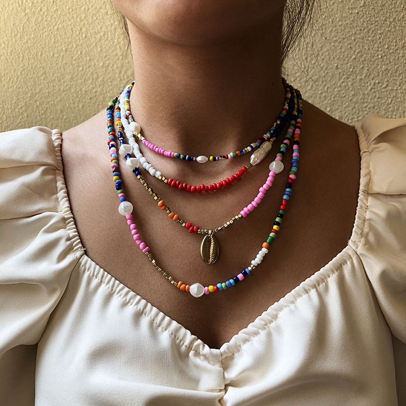 Wholesale Bohemian Vacation Style Rice Bead Necklace Female Fashion Ethnic Wind Imitation Pearl Clavicle Chain Alloy Pendant Vendors