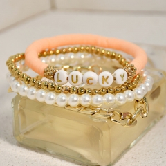 Jewelry Pearl Letterslucky Soft Pottery Bracelet Stretch Gold Bracelet 4 Pieces Set Supplier