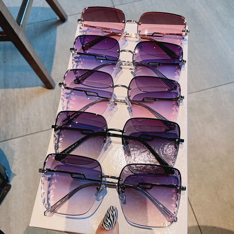 Wholesale Rimless Fashion Sunglasses Gradient Color Anti-uv Vendors