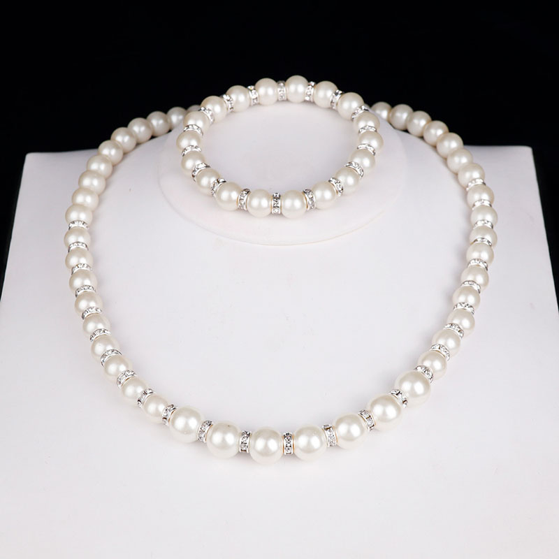 Pearl Necklace Bracelet Earrings Set Of Three Distributor