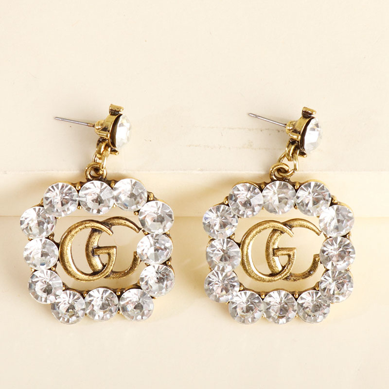 Fashion Letters Peplum Glass Colored Diamond Earrings Supplier