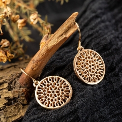 Fashion Round Hollow Carved Flower Alloy Earrings Manufacturer