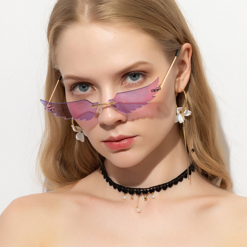 Dazzling Cat Eye Rimless Winged Sunglasses Distributor