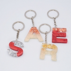 Wholesale Jewelry Red Quicksand Letters Keychain White Tassel Gold Foil Simple