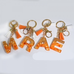 Wholesale Orange Shell Letters Keychain Crystal Drip Rubber Pendant Tassel