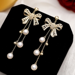 Wholesale Earrings French Vintage Baroque Pearl Silver Pin Earrings Bow Long Tassel