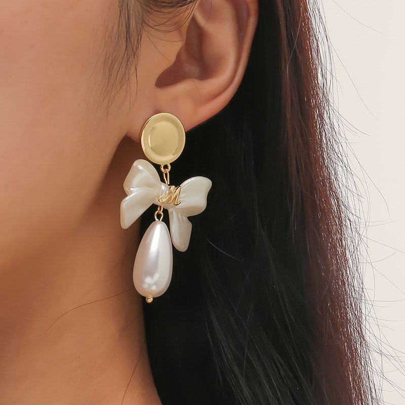 Korean Fashion Alloy Oval Simple Bow Pearl Earrings Distributor