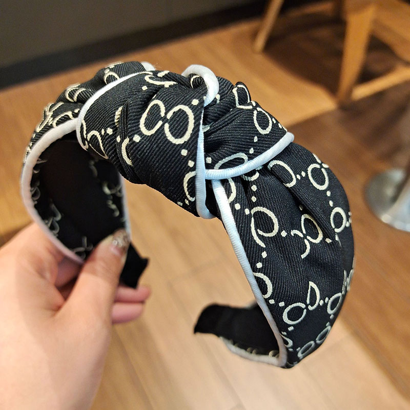 Letters Knotted Retro Clip Edge Fashion Headband Distributor