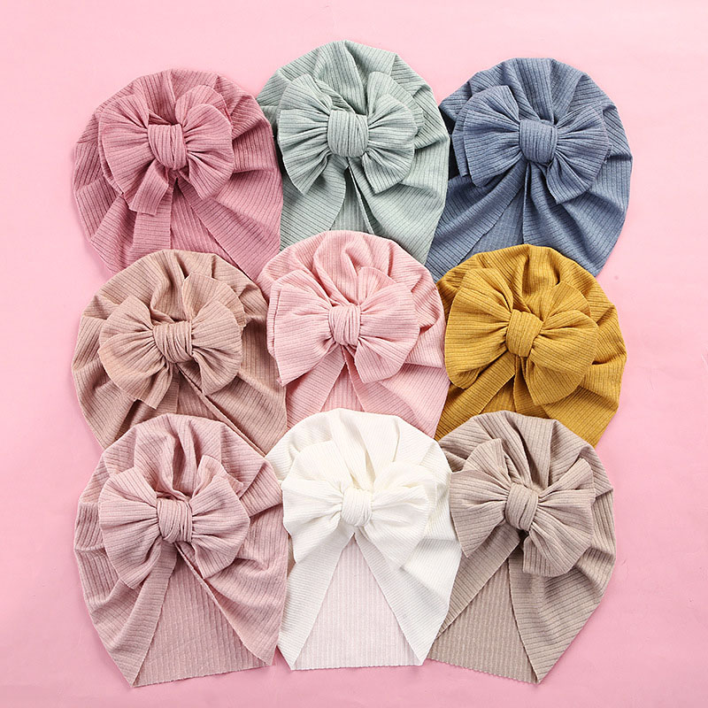 Soft Pitted Bow Children's Wrap-around Hat Supplier