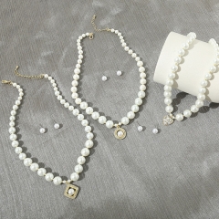 Wholesale Pearl Fashion Peach Heart With Diamond Pendant Necklace Earrings Set