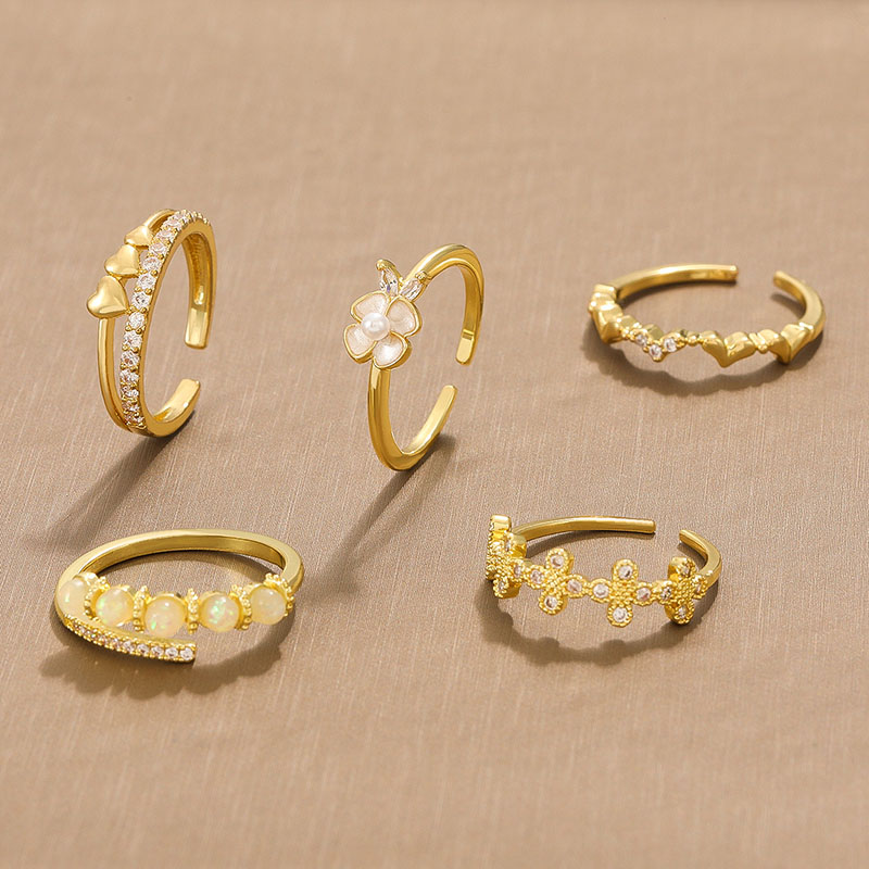 Wholesale Cat's Eye Stone Row Of Diamonds Fashion Love Flower Open Geometric Finger Ring