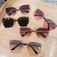 Wholesale Fashion Personality Cutting Edge Frameless Large Frame Anti-uv Sunglasses