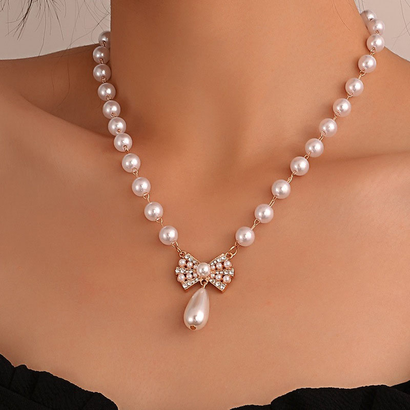 Wholesale Jewelry Diamond Encrusted Pearl Vintage Fashion Bow Pendant Collarbone Chain Simple Necklace