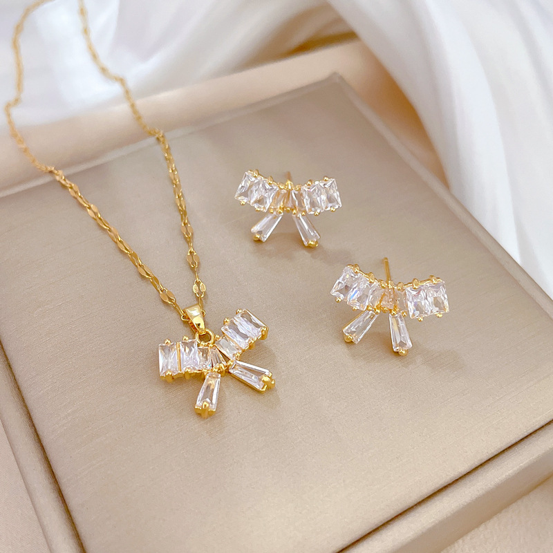 Wholesale Titanium Steel Light Luxury Full Diamond Bow Zircon Necklace Earrings Set