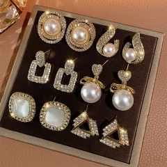 Silver Needle Pearl Rhinestone Earrings Wholesaler