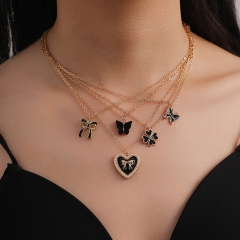 Juego De Collar Colgante De Amor De Mariposa Apilado Mayorista