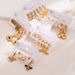Venta Al Por Mayor De Aretes De Amor De Ojos De Abeja De Acero Inoxidable