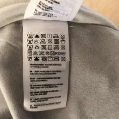 Belles étiquettes de soin de lavage personnelles imprimées sur mesure pour les vêtements de vêtement