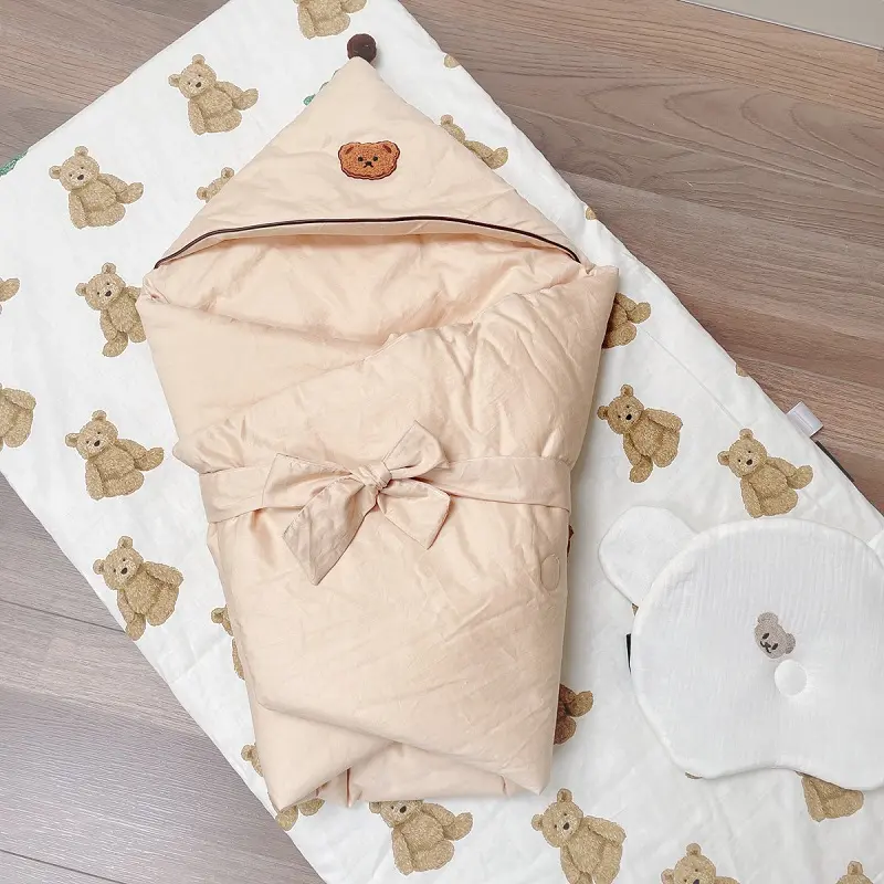 white muslin swaddle blankets