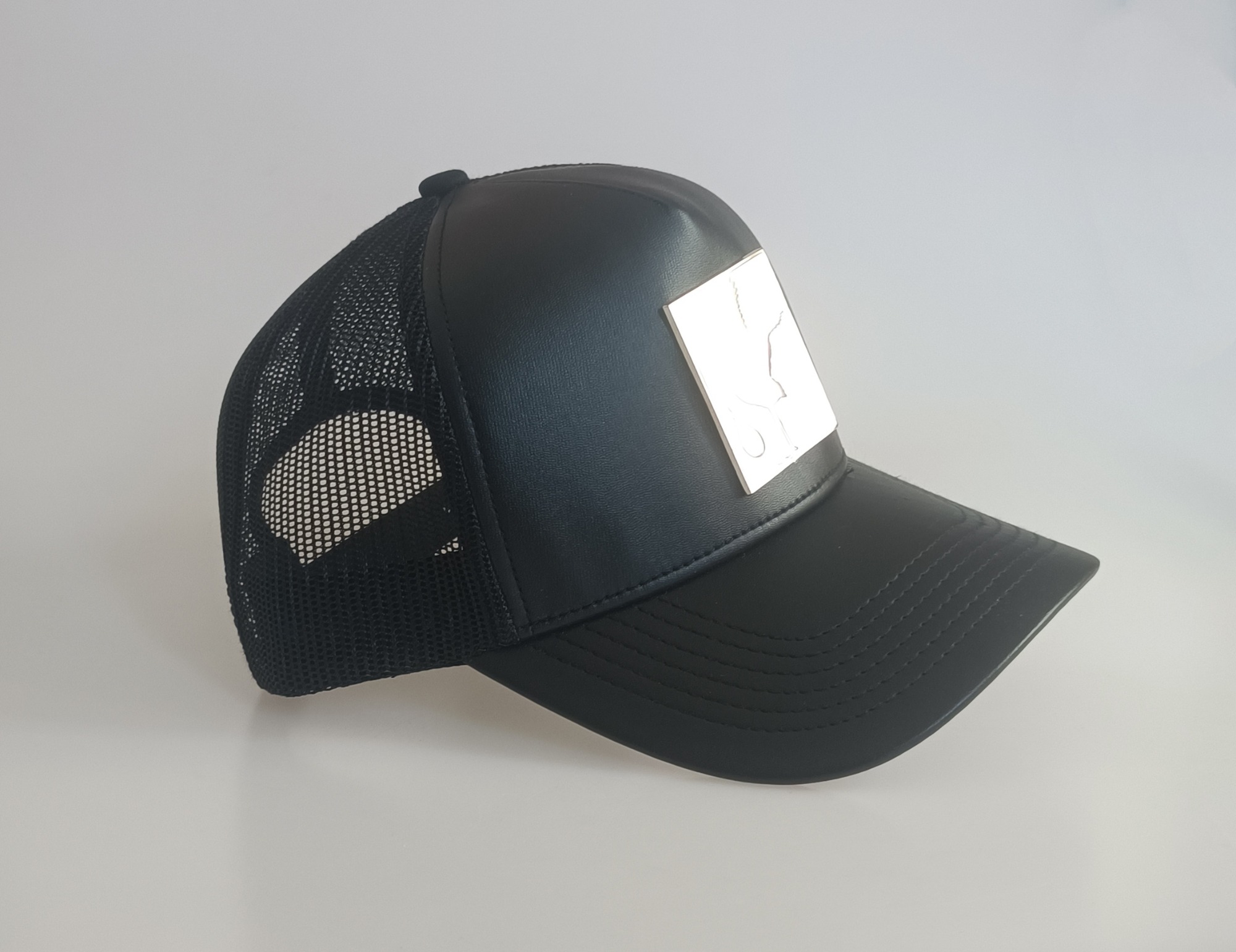 Custom black leather mesh hat metal patch logo high quality trucker cap hat