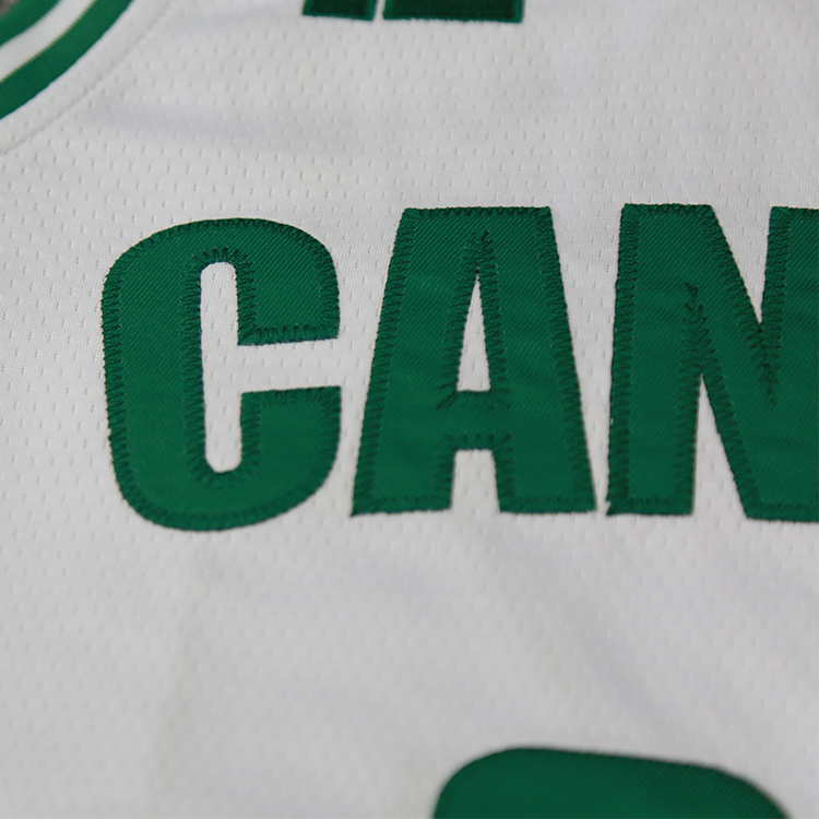 customizable white basketball uniform with embroidered logo