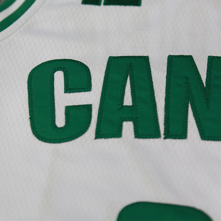 customizable white basketball uniform with embroidered logo