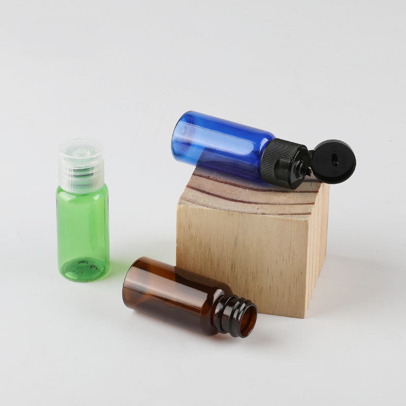 PET plastic round cosmetic lotion bottles with flip cap for travel clear small plastic bottle